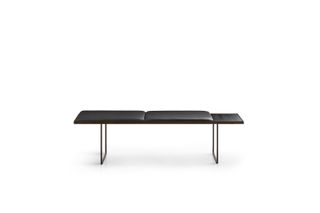 Simple bench with a black leather seat.