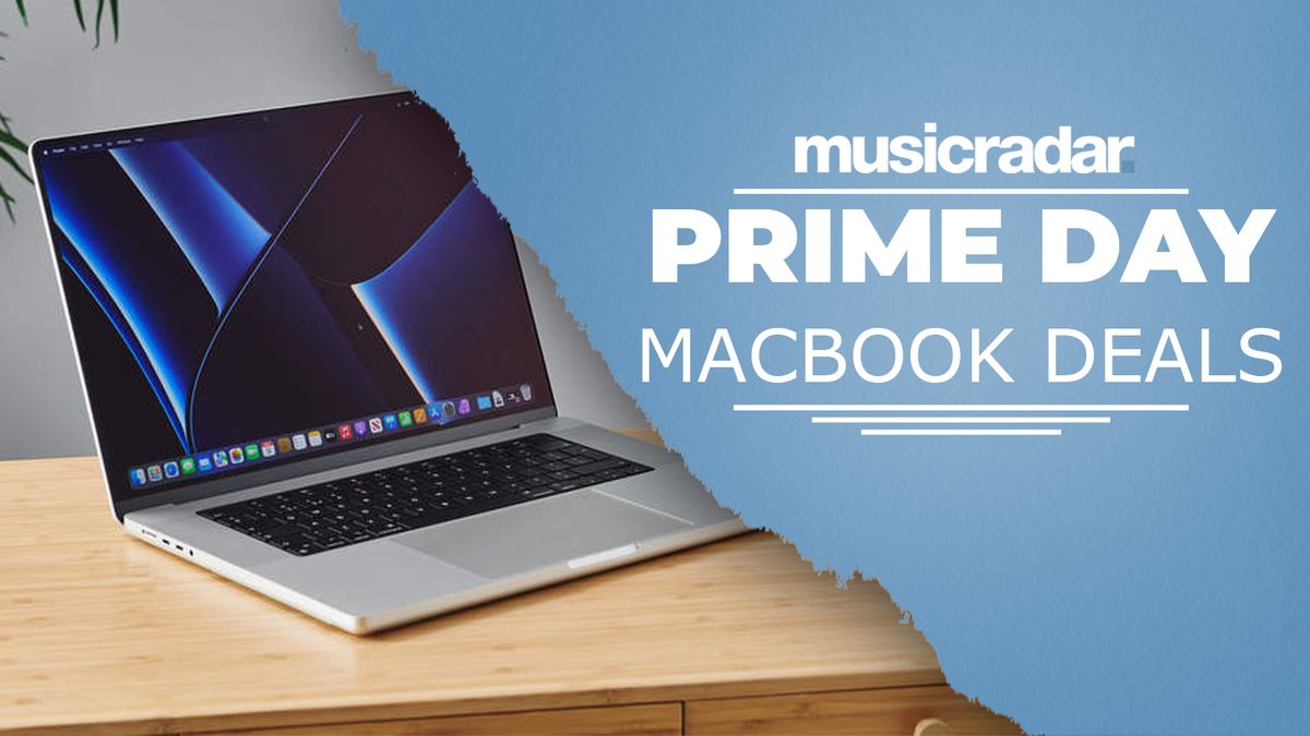 An Apple MacBook Pro on a desk with large text that reads &#039;Prime Day MacBook deals&#039;