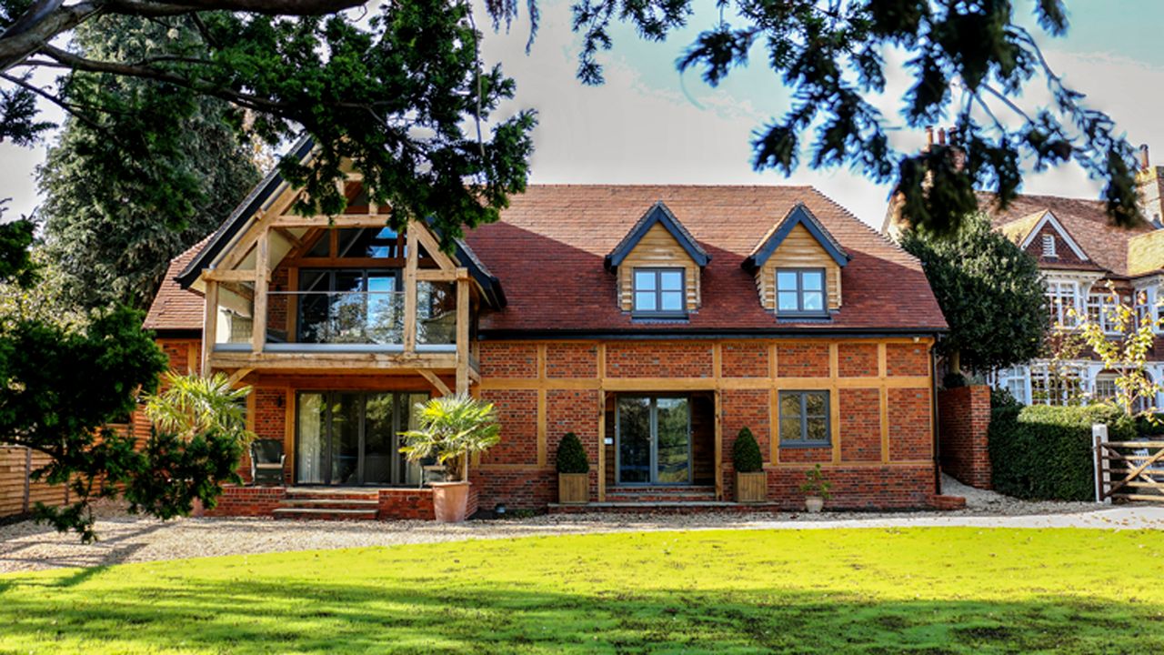 modern brick house with lawn