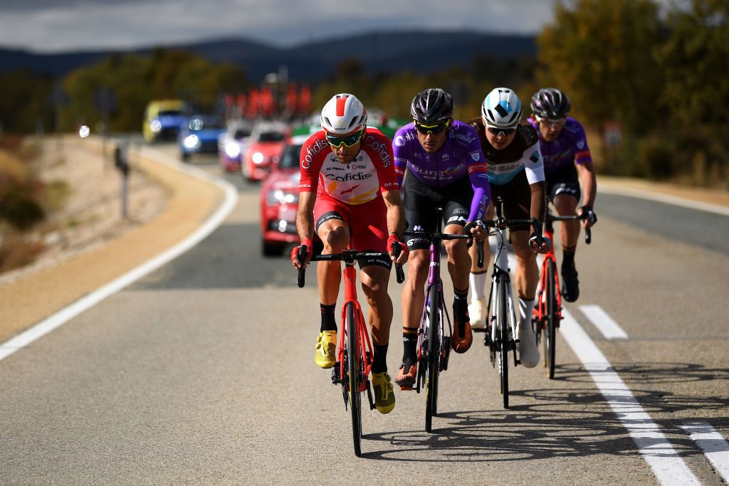 EJEADELOSCABALLEROS SPAIN OCTOBER 23 Harry Tanfield of The United Kingdom and Team AG2R La Mondiale Luis Angel Mate Mardones of Spain and Team Cofidis Solutions Credits Jesus Ezquerra Muela of Spain and Team Burgos BH Willie Smit of South Africa and Team Burgos BH Breakaway during the 75th Tour of Spain 2020 Stage 4 a 1917km stage from Garray Numancia to Ejea de los Caballeros lavuelta LaVuelta20 La Vuelta on October 23 2020 in Ejea de los Caballeros Spain Photo by David RamosGetty Images