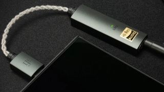 The iFI Go Link Max connected to a smartphone.