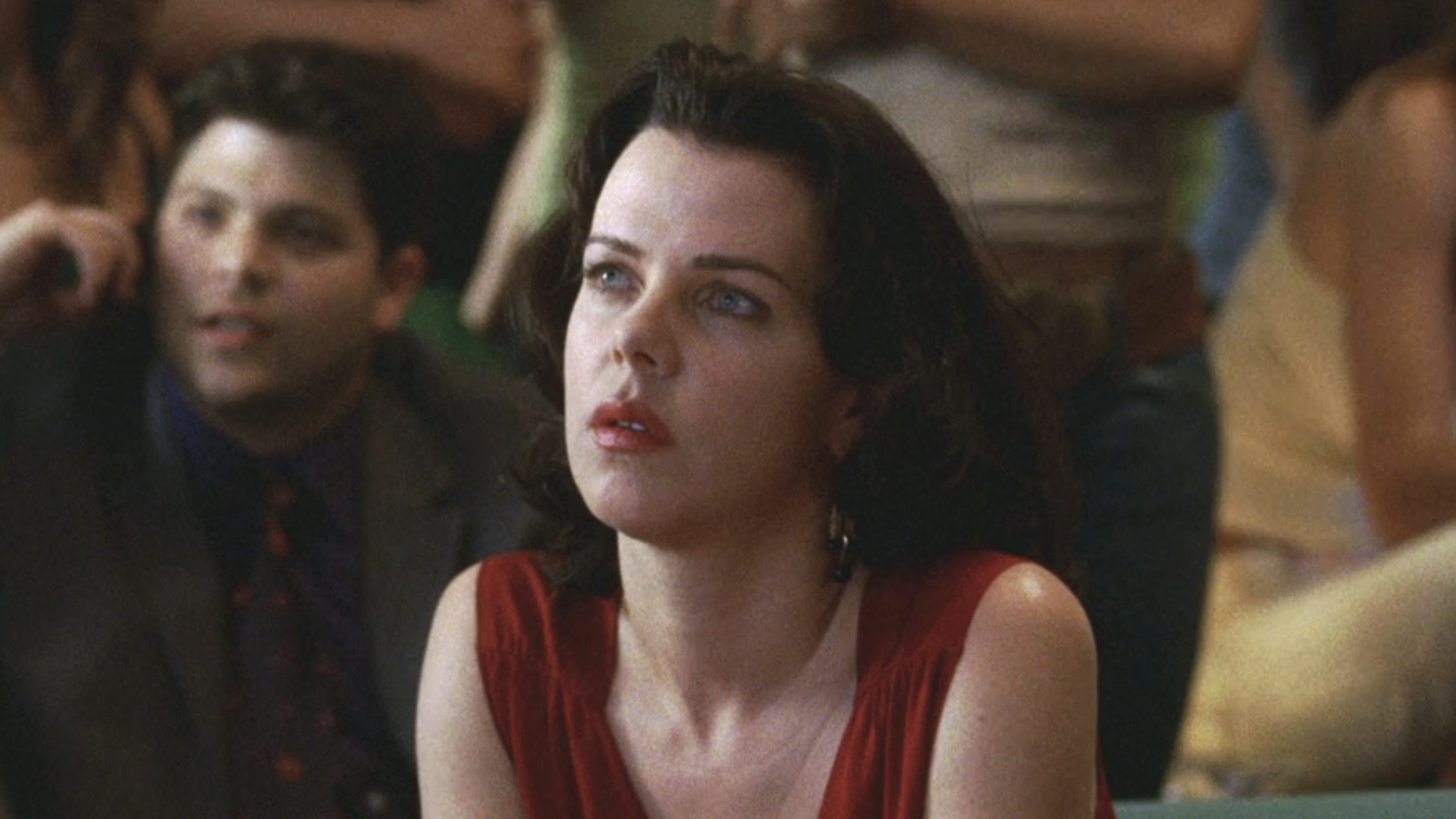 Shauna Roberts (Debi Mazar) watches her client do an interview on Entourage.