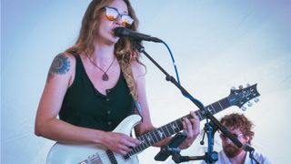 Press photos of Magnolia Boulevard performing live with PRS guitars