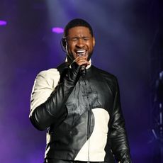Usher performing at an event
