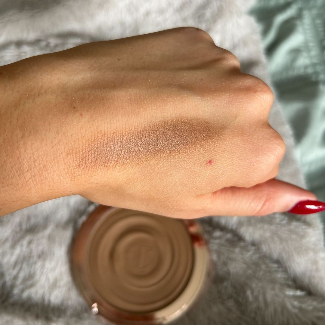 Swatch of Charlotte Tilbury Beautiful Skin Bronzer on hand