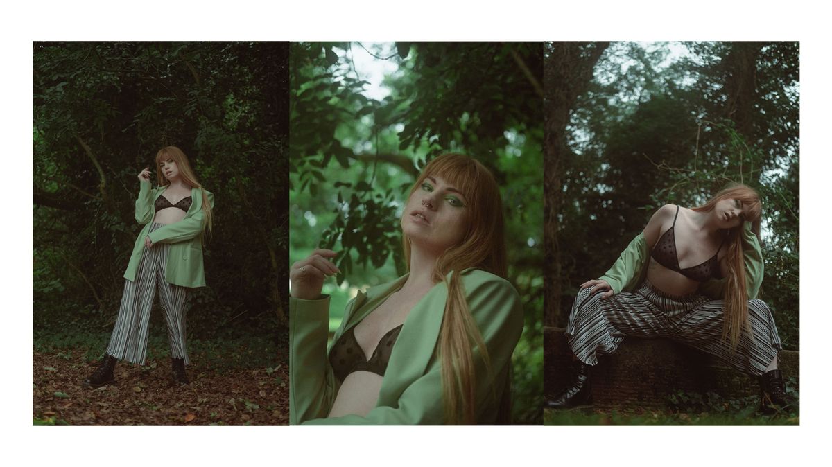 ginger woman modelling a green blazer