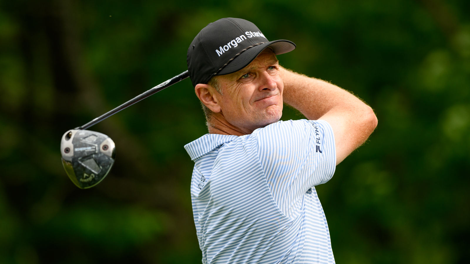Justin Rose hits a driver off the tee