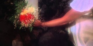 Laying flowers on Carrie's grave in Carrie 1976