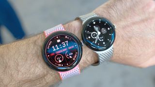 Google Pixel Watch 3 XL (right) on the wrist next to a Pixel Watch 3