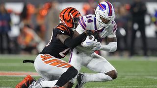 Stefon Diggs of the Buffalo Bills is tackled by Cam Taylor-Britt of the Cincinnati Bengals ahead of the huge Bills vs Bengals NFL Playoff match on Sunday January 22, 2023.