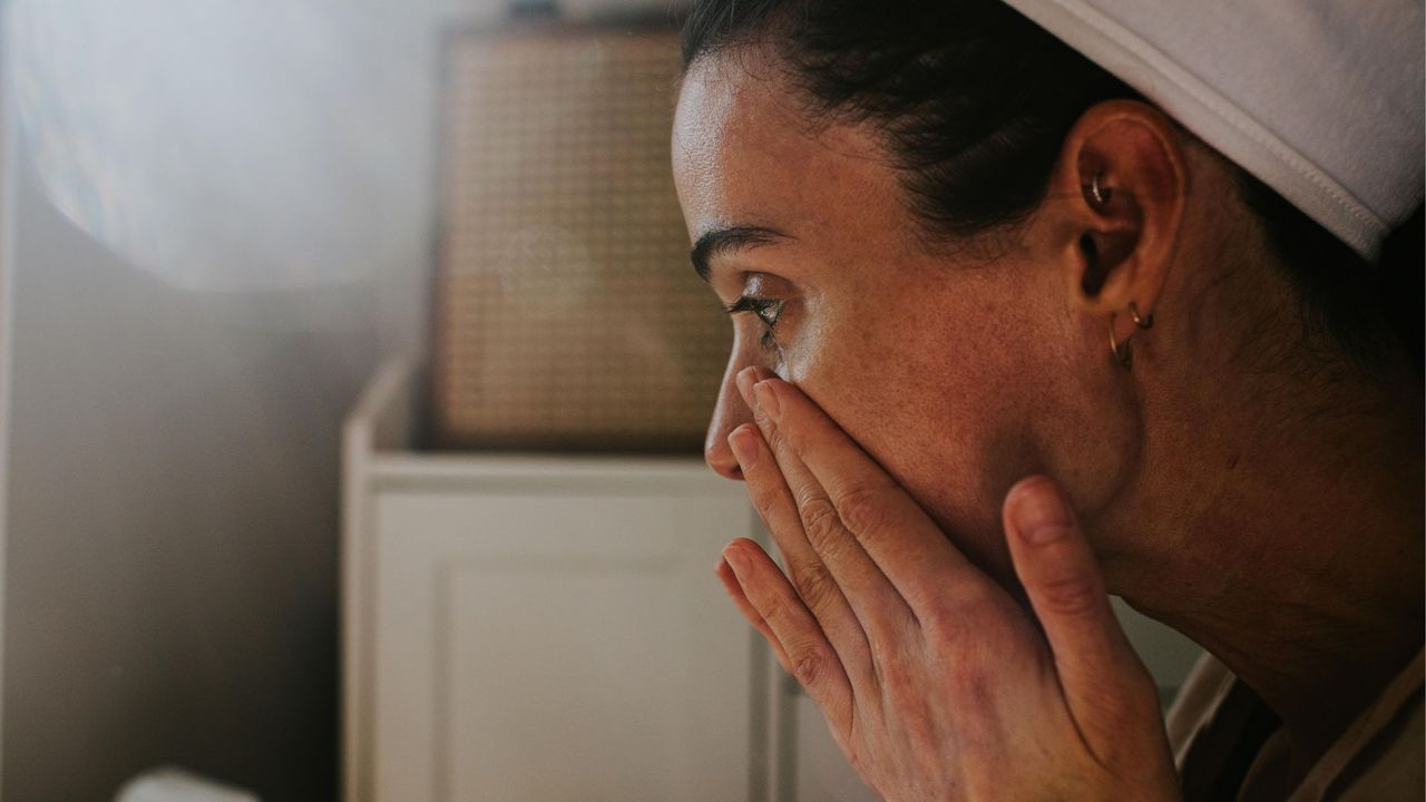 woman using skincare