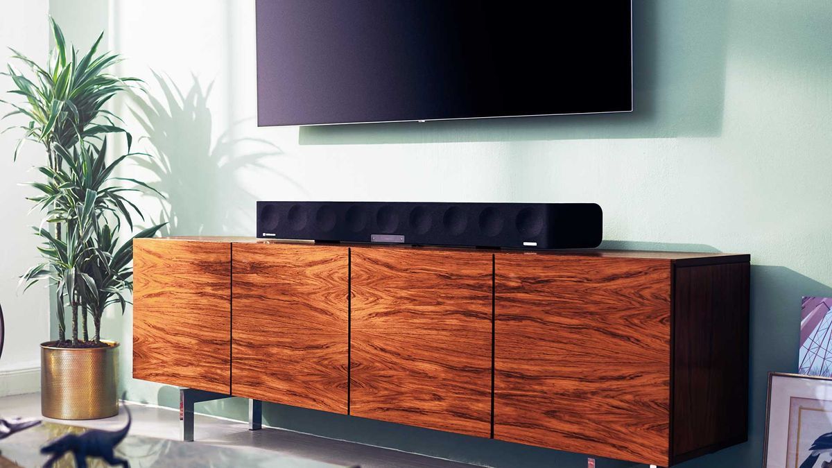 Sennheiser Ambeo Soundbar Max on a sideboard under a flatscreen TV