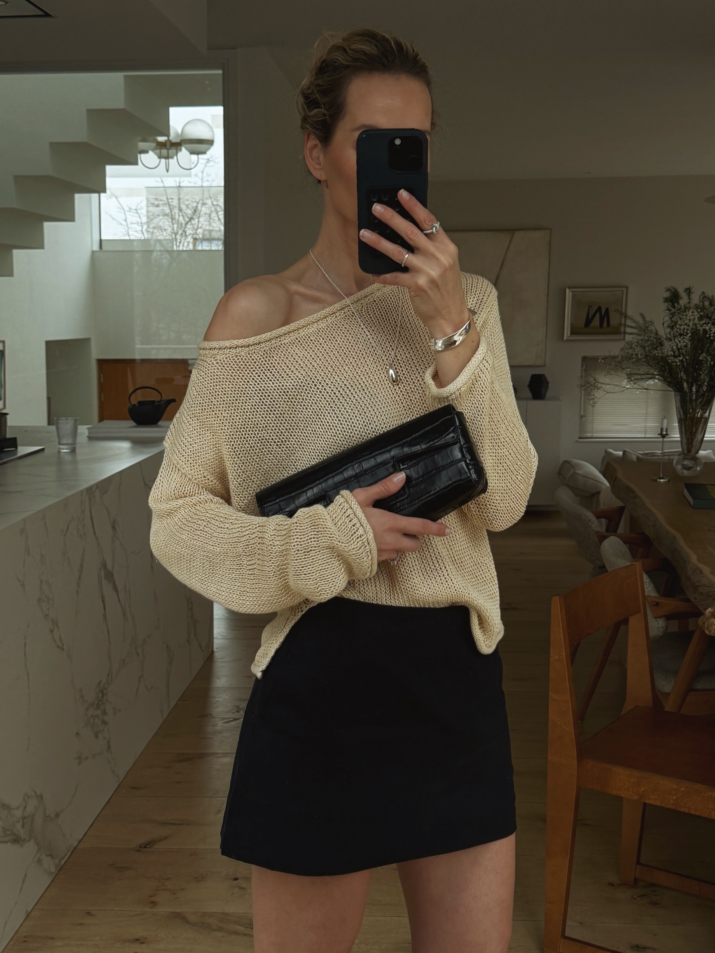 Anouk Vye wears a knit top and shorts as a styling hack for summer 2026