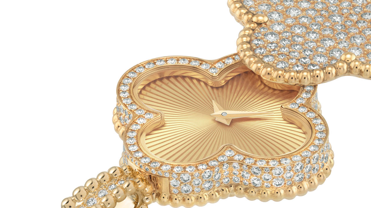 Alhambra pendant watch in diamond and with a guilloche face