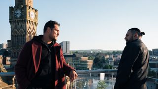 Harry Virdee and Riaz Hyatt talk as they look out at the Bradford skyline