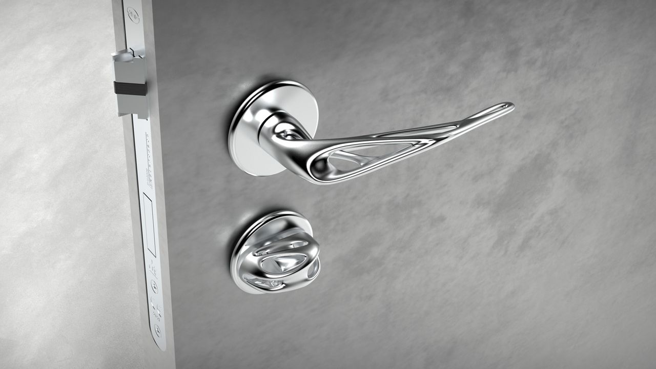 silver door handle on grey door