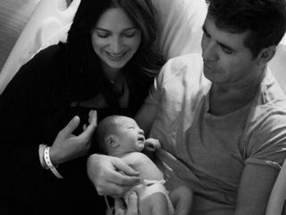 Simon Cowell shares baby pics of his son Eric via Twitter..