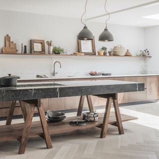 freestanding trestle style island with chunky worktops