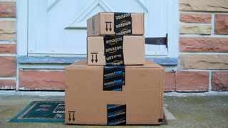 Amazon Prime boxes sitting in front of porch