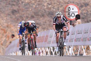 Soren Kragh Andersen accelerates away as Rui Costa looks over his shoulder to see what's coming