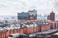 the Elbphilharmonie in Hamburg, by the water on a cloudy day