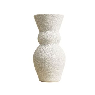 A ceramic vase with textured surface