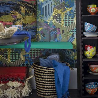 jungle themed dining room with tropical wallpaper and storage unit