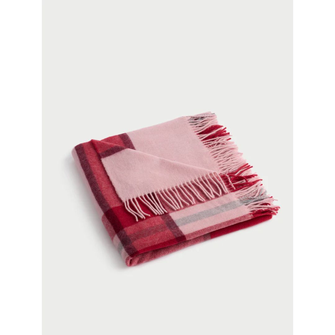 tasseled pink throw blanket from cozy earth