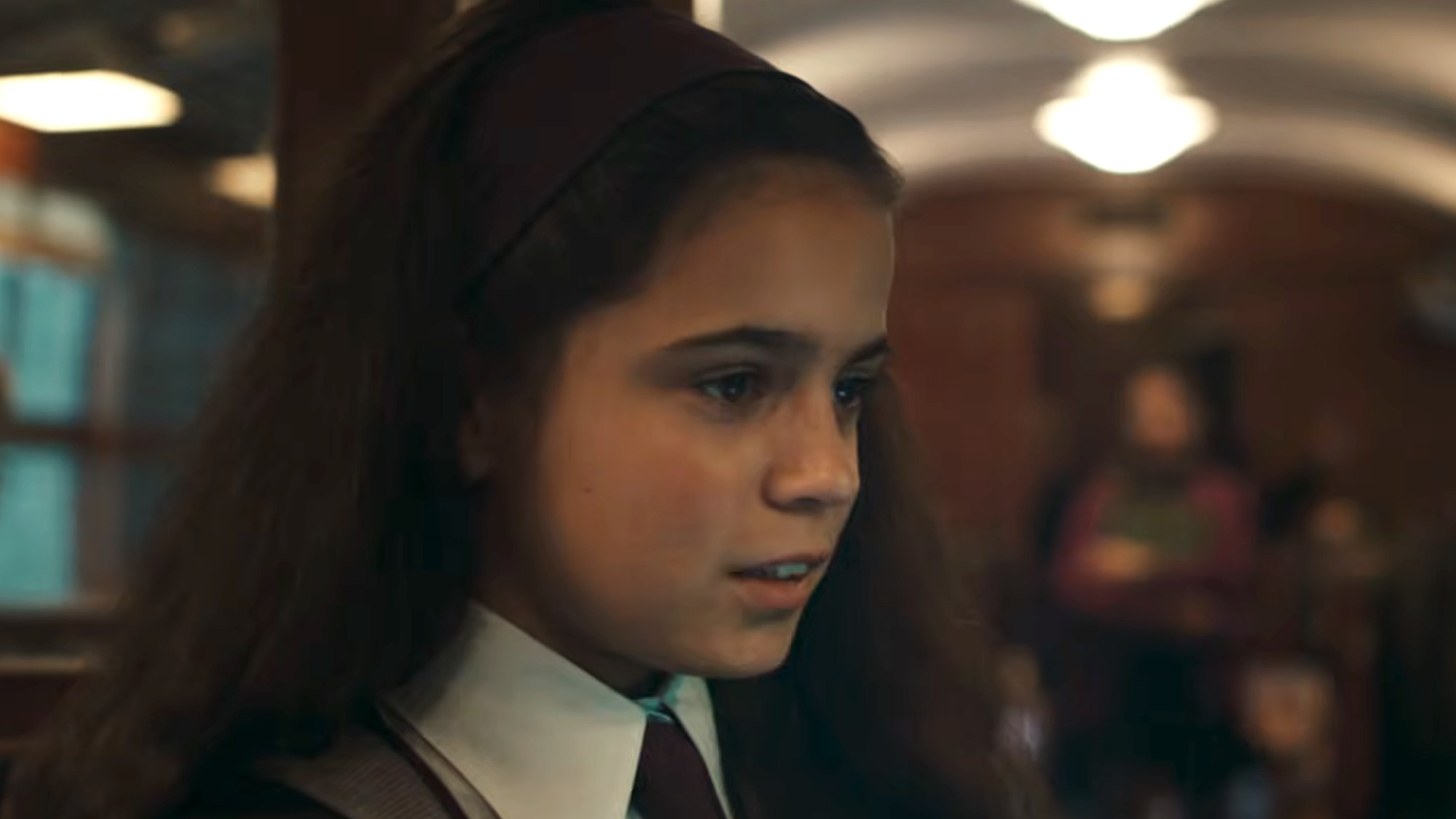 Hermione on the train in the Harry Potter TV show