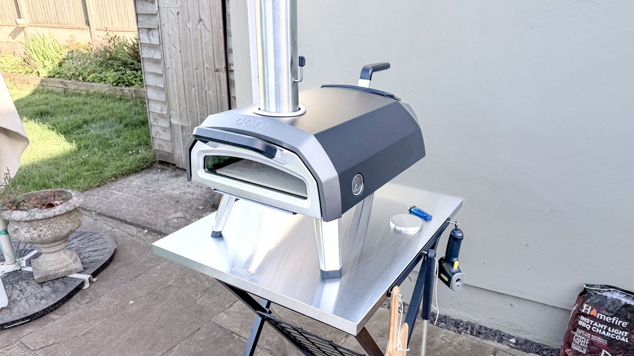 Ooni Karu 2 pizza oven outdoors on a table
