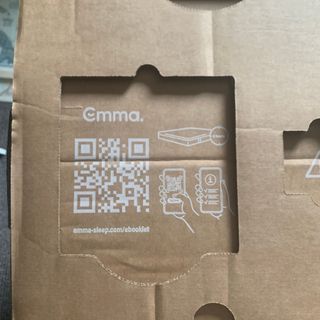 The QR code at the top of the Emma mattress box