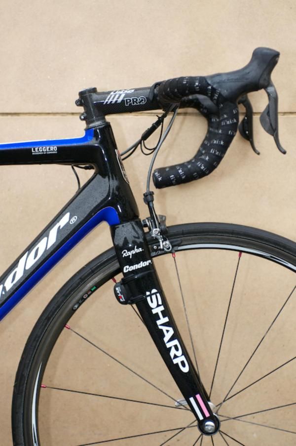 Neat detailing with all sponsors listed. Note Rapha stripes at dropout.