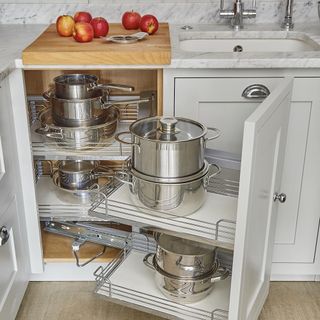 kitchen with storage drawer and apples