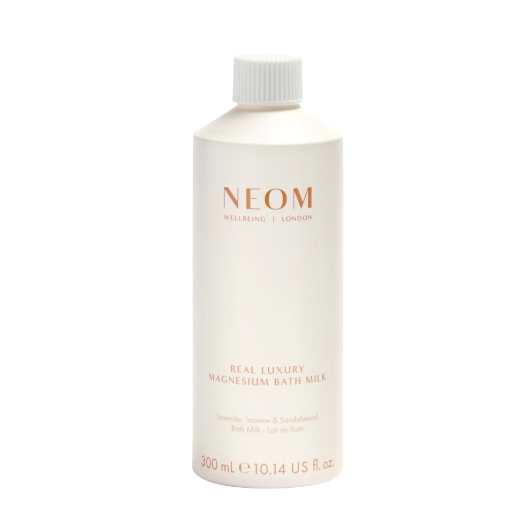A product shot of the NEOM Wellbeing Real Luxury Magnesium Bath Milk, on a white background