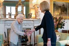 The Queen (left) shakes the hand of new Prime Minister Liz Truss (right) in her living room at Balmoral Castle