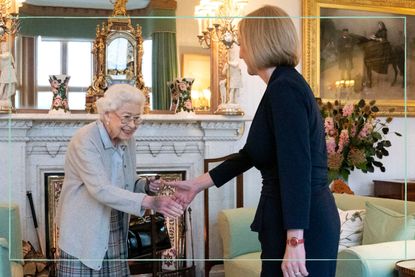 The Queen (left) shakes the hand of new Prime Minister Liz Truss (right) in her living room at Balmoral Castle