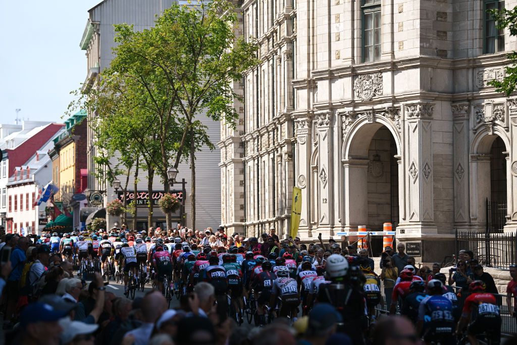 QUEBEC CITY QUEBEC SEPTEMBER 09 A general view of the peloton passing through Qubec City during the 11th Grand Prix Cycliste de Qubec 2022 a 2016km one day race from Quebec to Quebec GPCQM on September 09 2022 in Quebec City Quebec Photo by Dario BelingheriGetty Images