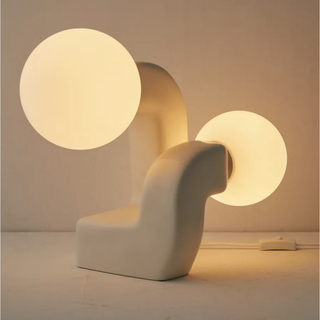 curved white table lamp