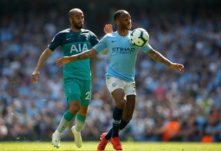 Raheem Sterling, right, in possession for City