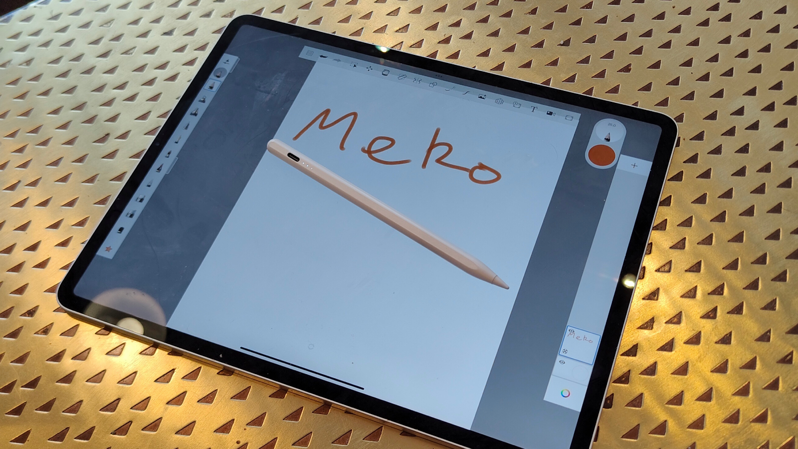 The Meko Stylus Pen on top of an iPad.