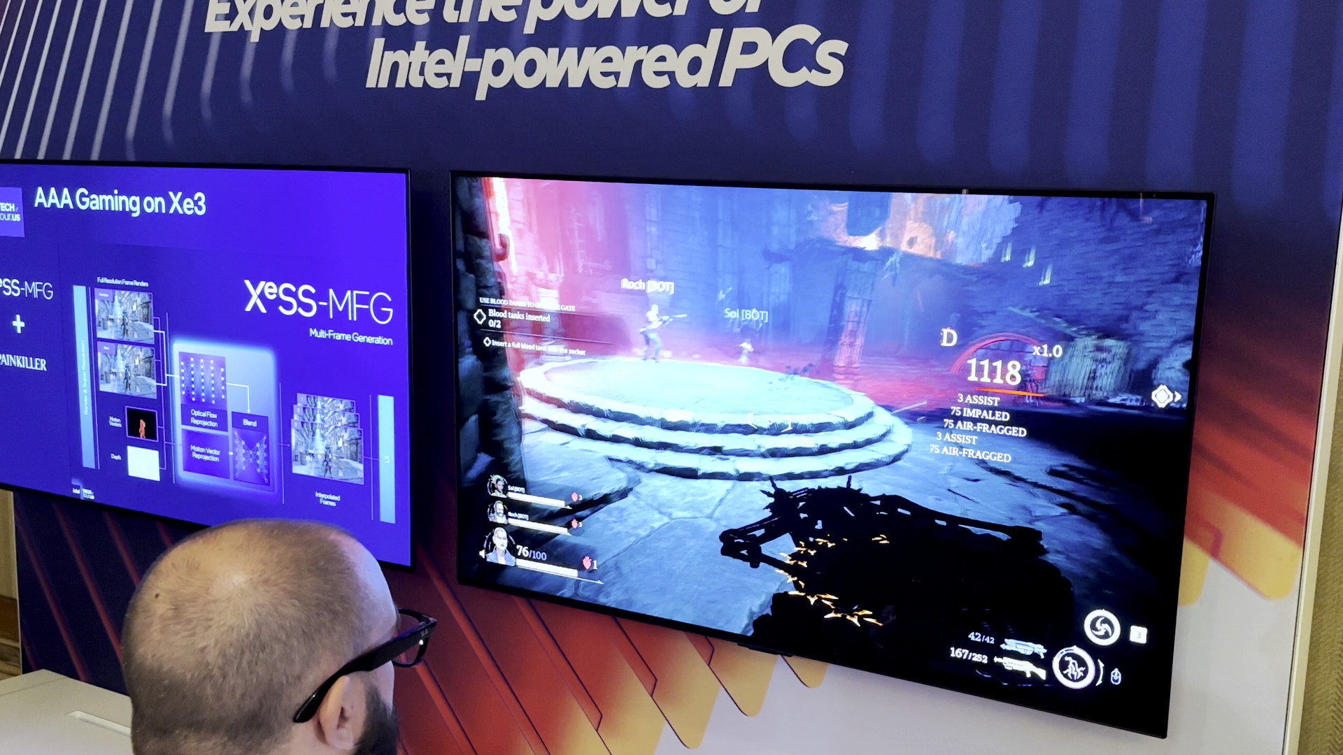 A photo of an Intel XeSS 3 demonstration, showing the use of multi-frame generation in a game.