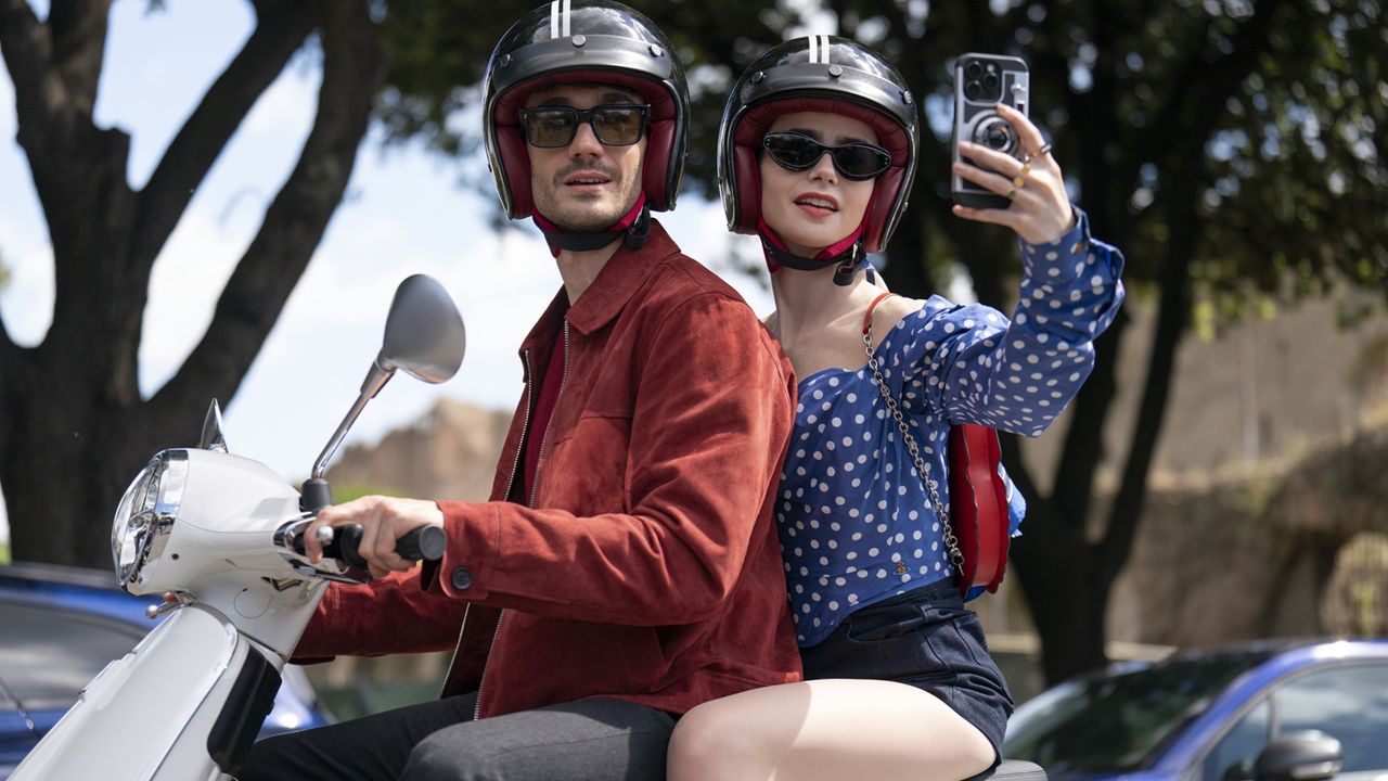 Eugenio Franceschini as Marcello, Lily Collins as Emily in episode 409 of Emily in Paris