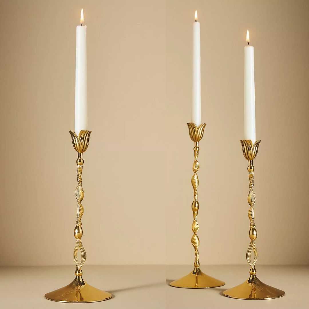 tbale decor - three gold candlesticks holding taper candles