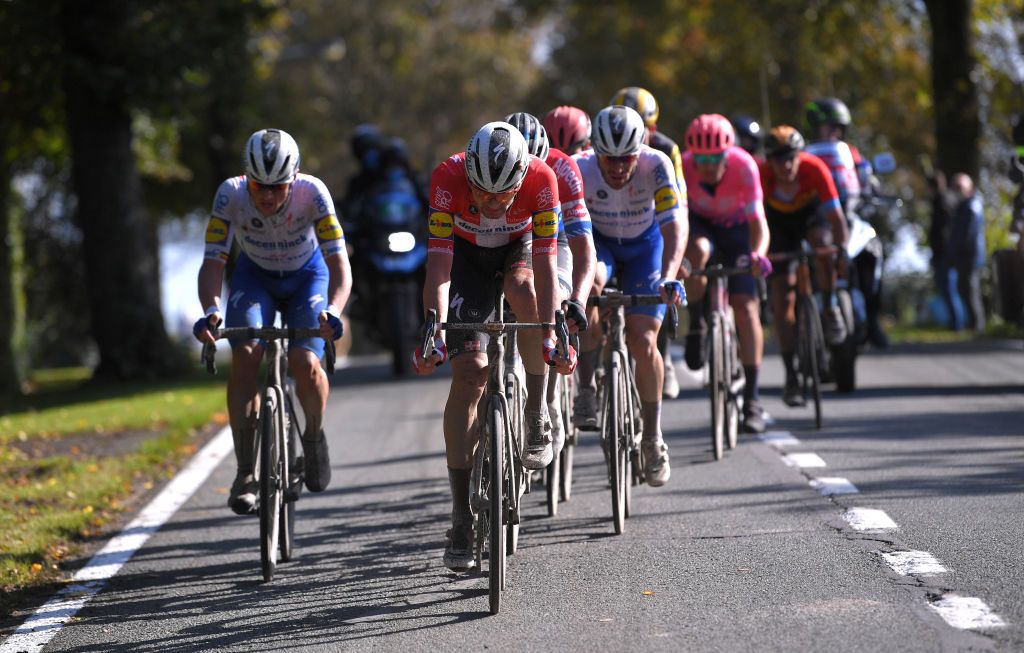 WEVELGEM BELGIUM OCTOBER 11 Kasper Asgreen of Denmark and Team Deceuninck QuickStep Mathieu Van Der Poel of The Netherlands and Team AlpecinFenix Yves Lampaert of Belgium and Team Deceuninck QuickStep Florian Senechal of France and Team Deceuninck QuickStep Breakaway during the 82nd GentWevelgem In Flanders Fields 2020 Men Elite a 2325km race from Ypres to Wevelgem GentWevelgem FlandersClassic on October 11 2020 in Wevelgem Belgium Photo by Luc ClaessenGetty Images