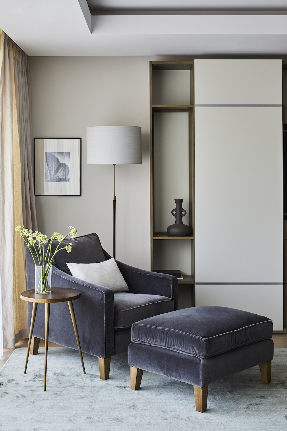grey chair and foot stool
