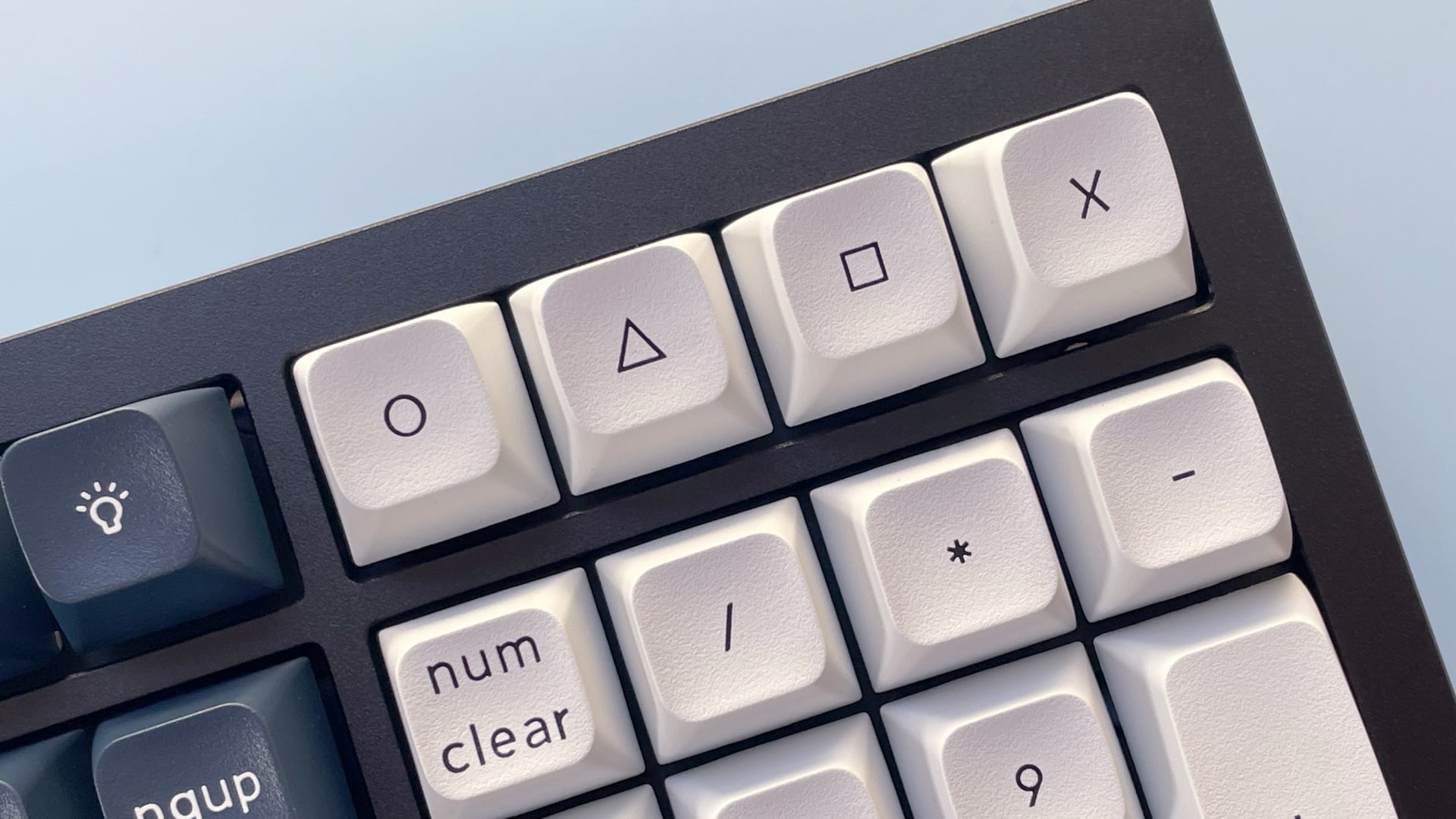 The Keychron Q6 Max mechanical keyboard against a blue background.