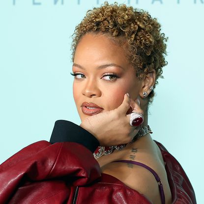 Rihanna attends a fenty beauty hair launch party with natural curls