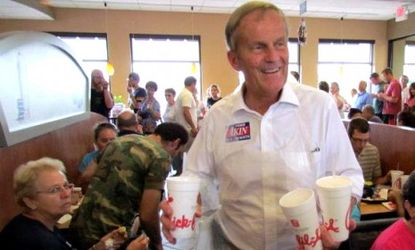 Rep. Todd Akin helps serve Chick-Fil-A supporters at a Missouri location Aug. 1.