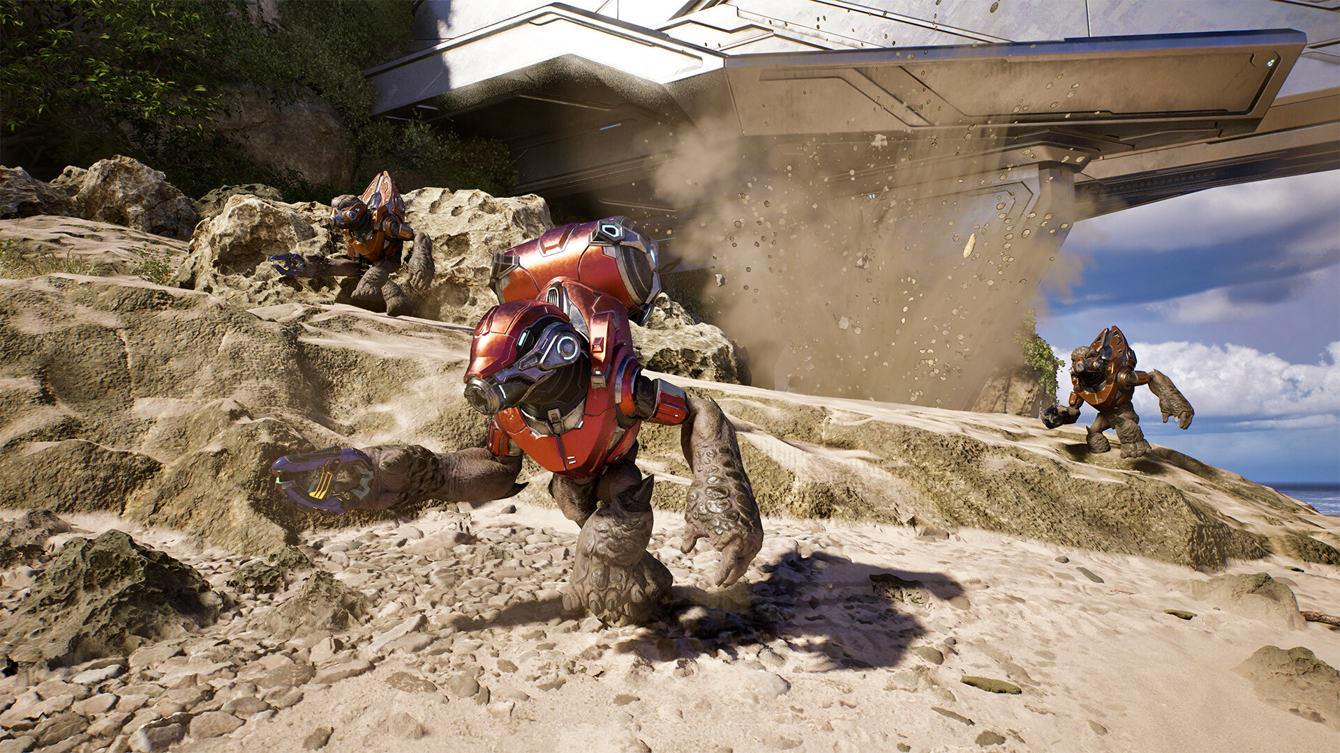Halo: Combat Evoled screenshot showing a grunt running away from an explosion in the sand