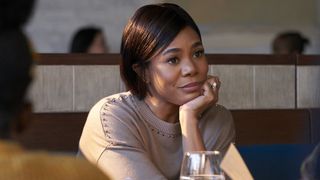 Regina Hall as Candace at a restaurant thinking in The Best Man: The Final Chapters
